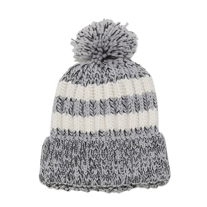 Detail of grey and beige striped knit beanie with fluffy pompom and wide ribbed cuff