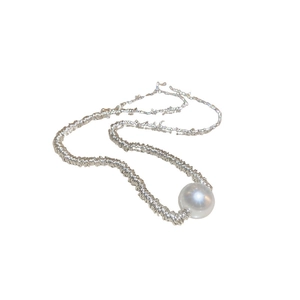 Minimalist silver necklace with textured metallic chain and large white pearl pendant