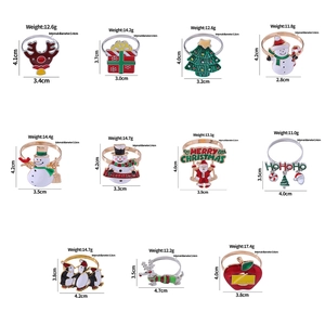 Detailed size and weight chart for various Christmas metal napkin rings and holders