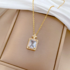 Titanium steel necklace with rectangle cubic zirconia pendant on silk background