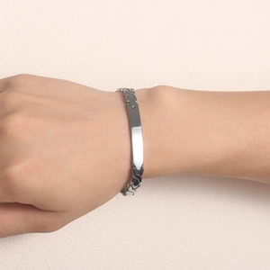 Polished stainless steel bracelet for women featuring a minimalist rectangular blank plate