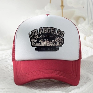 Red and white trucker hat with Los Angeles California graphic and mesh back panels