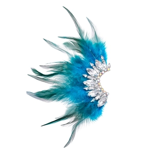Bohemian feather ear cuff with blue gradient plumes and sparkling crystals on white base