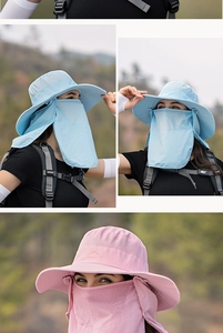 Detail of outdoor sun hat with detachable face cover and breathable mesh in blue and pink