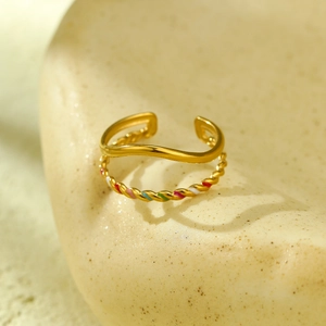 Detailed close-up of 18K gold plated double layer ring with colorful enamel drip glaze