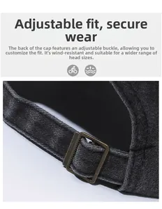 Detail of adjustable metal buckle and grey fabric texture on the baseball cap