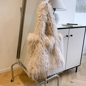 Large capacity beige plush tote bag with tassel detail for women, casual winter style