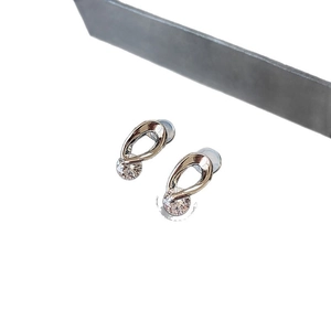 Elegant silver hollow teardrop earrings with round zircon stones in a minimalist style