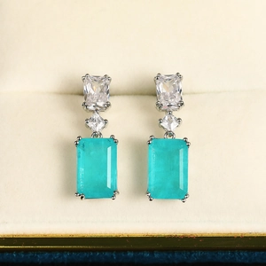 Square Paraiba tourmaline drop earrings in silver claw setting for elegant gift