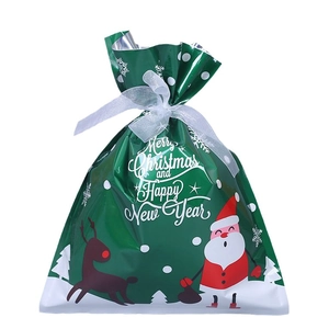 Green Christmas drawstring gift bag with Santa and Reindeer, Merry Christmas print