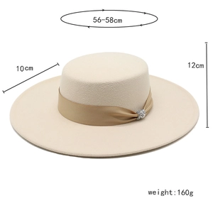 Detail of wool fedora hat with satin ribbon and rhinestone buckle, 10cm brim measurements