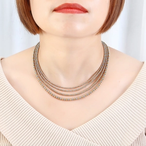 Collana a quattro strati con sfere dorate in acciaio inossidabile per donna
