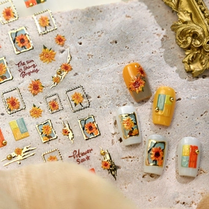 Sunflower nail stickers with 3D gold frames and vintage floral art for manicures