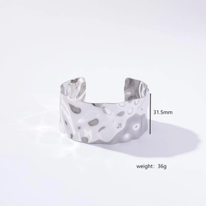Wide hammered silver-tone open cuff bracelet made of stainless steel for women