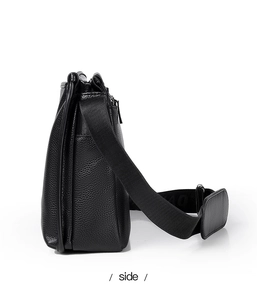 Side view of black lychee grain leather men's shoulder bag showing thickness and strap