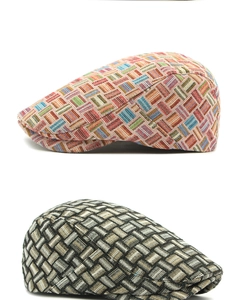 Close-up of woven textures on ethnic style newsboy caps in colorful and black-white plaid
