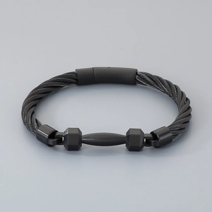 Detail of matte black cable bracelet with barbell charm made of durable stainless steel