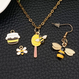 4pcs gold-plated enamel bee and honey jar charms for DIY jewelry making and crafts