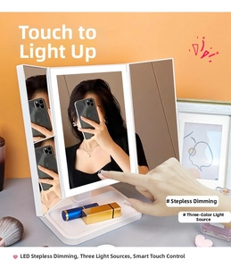 Close-up of touch-sensitive LED tri-fold makeup mirror with three-color lighting modes