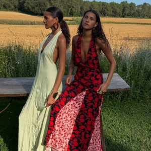 Summer backless halter dresses in light green and floral print on a wheat field background