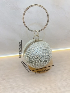 Silver spherical evening clutch bag with crystal rhinestones and circular handle