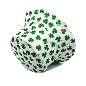 Close-up of green shamrock pattern printing on white canvas bucket hat fabric