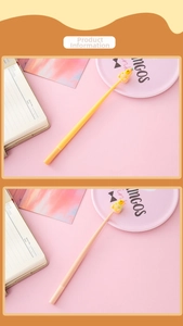 Detail of yellow and pink cartoon animal gel pens placed on stationery for school and office