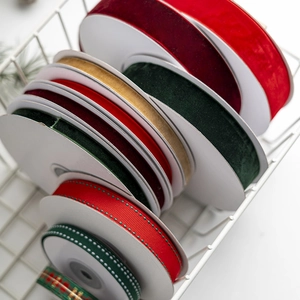 Assorted Christmas decorative velvet and plaid ribbons for gift wrapping and DIY crafts