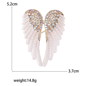 Sparkling angel wing brooch with white zircons and crystals measuring 5.2cm by 3.7cm