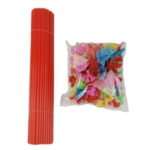 Set of durable red plastic balloon sticks and colorful holder cups on white background