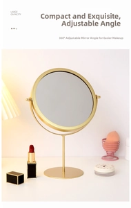 Minimalist gold metal round makeup mirror with 360-degree adjustable tilt angle