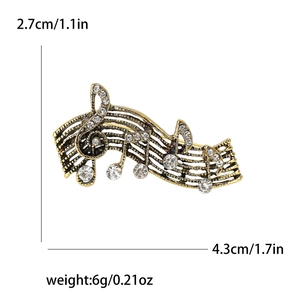 Golden musical note brooch with crystals, size 4.3x2.7cm, weight 6g, stylish lapel pin