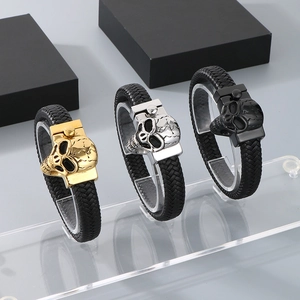 Braided leather skull bracelets in gold, silver, and black finish with metal clasps