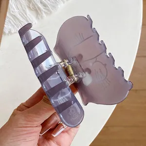 Handheld purple translucent acrylic cartoon cat hair claw clip with gold spring detail