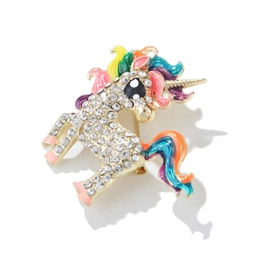 Exquisite gold unicorn brooch with sparkling rhinestones and colorful enamel details