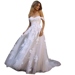 Elegant off-the-shoulder lace wedding dress with floral appliques and a sweeping A-line skirt