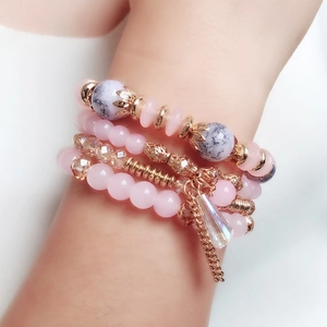 Bohemian multi-layer beaded bracelet set with pink crystals and gold-tone accents