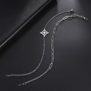 Double-layer silver stainless steel bracelet featuring Celtic knot charm and paperclip chain