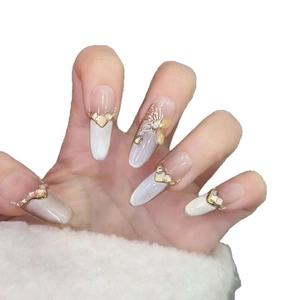 Elegant cat eye press-on nails with 3D butterfly and crystal diamond accents