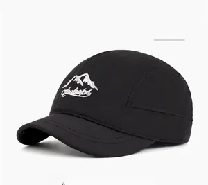 Detail of black quick-dry nylon baseball cap featuring snow mountain embroidery design