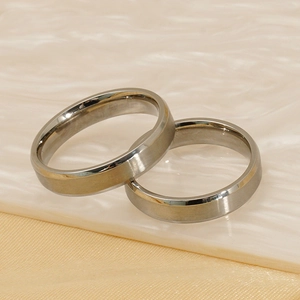 Polished minimalist titanium steel couple rings with brushed finish and smooth inner surface