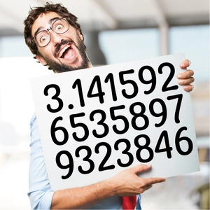 Close-up of a person holding a 4-inch vinyl letter sticker poster for classroom decoration