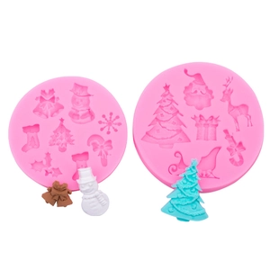 Christmas themed silicone mold featuring tree snowman and reindeer shapes for DIY candles