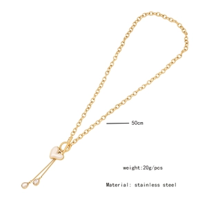 Detail of 50cm stainless steel gold chain with heart and waterdrop charms