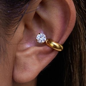 Classic 18K gold stainless steel ear cuff featuring a large round cubic zirconia stone