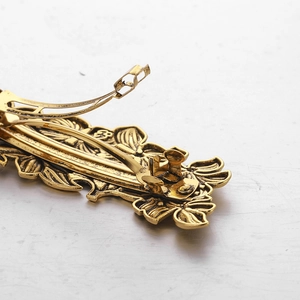 Vintage golden flower metal hair clip with Nordic relief patterns and spring clasp