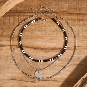Three-layer men's necklace set with silver chains, round pendant and brown wood beads
