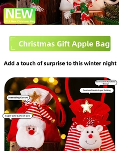 Detail of high-quality double-layer knitted Christmas gift bag with Santa and reindeer dolls