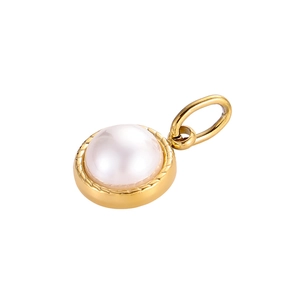 Macro detail of round white pearl pendant with polished gold metal base and ring