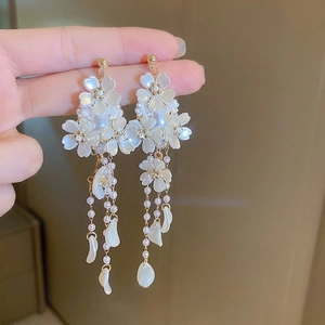 Elegant flower drop earrings with long pearl tassels and white mother of pearl leaf charms